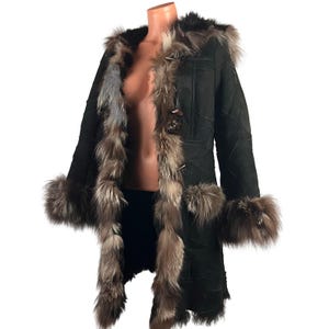 May include: A dark green coat with fur trim around the hood, collar, cuffs, and down the front. The coat has a patchwork design and is fastened with toggle closures. The fur is a mix of brown, gray, and cream colors.