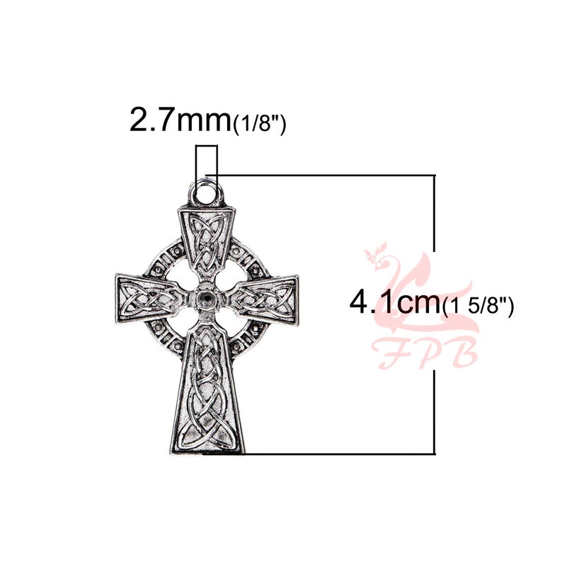 May include: Silver Celtic cross charm pendant with intricate knotwork design. Measures 1 5/8 inches in height and 1/8 inch in width.