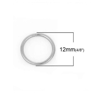 May include: A silver metal ring with a 12mm (4/8") diameter.