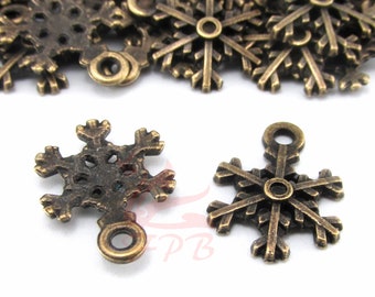 10 Snowflake Charms 18mm Pendentifs d’hiver en bronze antique BC0131552