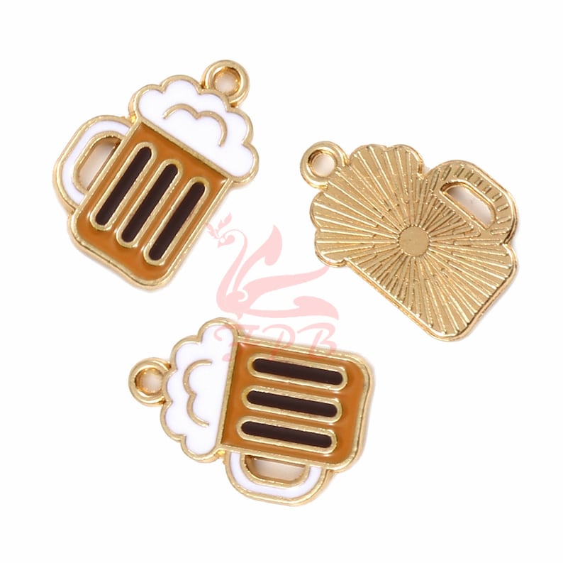 May include: Three gold-colored metal charms shaped like beer mugs. One mug has a white foam top and brown liquid, another has a white foam top and brown liquid, and the third is a solid gold mug with a sunburst design.