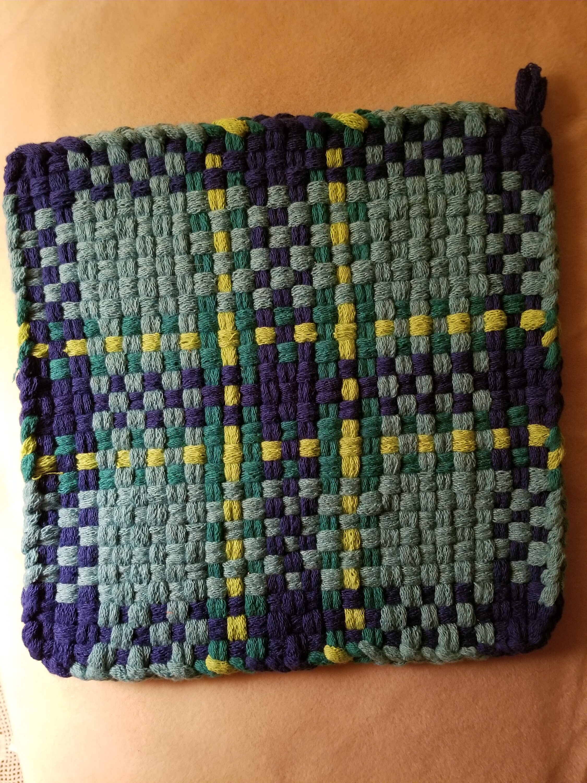 Hand woven pot holders artistically designed to utilise the Etsy