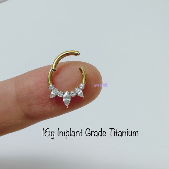 Implant Grade Titanium Pave CZ White Opal Marquise Gem Hinged Clicker Hoop Implant Grade Titanium Pave CZ White Opal Marquise Gem Hinged Clicker Hoop