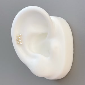 Tiny Pearl Curved Barbell: 16g Helix Conch Piercing