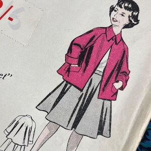 May include: A vintage Practical Paper Pattern envelope for a Shortie-Jacket, size 8-10 years, No. 4076. The white envelope features a black and pink illustration of a jacket and skirt set, with the text 2/-, Shortie-Jacket, and No. 4076.