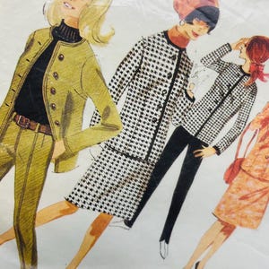 May include: A vintage sewing pattern envelope featuring illustrations of four outfits: a chartreuse suit, a black and white houndstooth coat and skirt, a houndstooth jacket with black trousers, and an orange patterned skirt suit with handwritten notes.