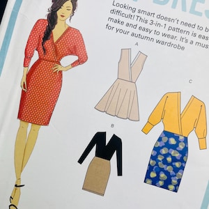 May include: A sewing pattern for a 3-in-1 dress, featuring illustrations of three different dress styles. The pattern includes sizes S-XL. The cover art shows a woman in a red polka dot dress.