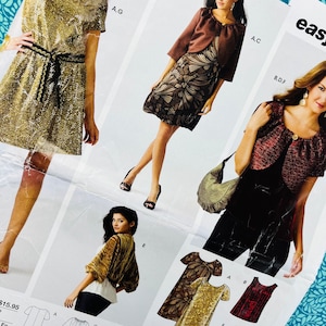 May include: A sewing pattern envelope featuring illustrations and photographs of various garments including a gold sequined dress, a brown bolero jacket over a floral dress, a red and black textured bolero over a black top, and a gold top.