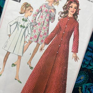 May include: Vintage Simplicity sewing pattern featuring illustrations of three women in different long coats. The coats include a white coat with green accents, a floral print coat, and a quilted red coat. The pattern is for Misses Size 12, Bust 34.