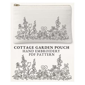 May include: A white pouch with a zip closure, adorned with a black embroidered floral design. The text "COTTAGE GARDEN POUCH HAND EMBROIDERY PDF PATTERN" is below. The design features a variety of flowers and foliage.