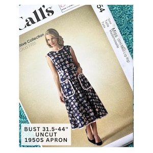 May include: Vintage 1950s apron sewing pattern. The pattern features a woman wearing a navy blue apron with a white trim and a pattern of small figures. The text on the pattern reads "BUST 80-112 cm UNCUT 1950S APRON".