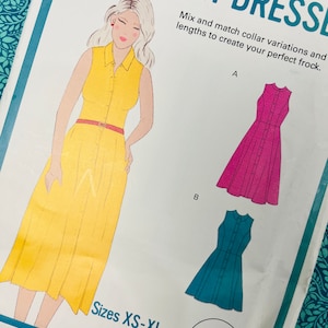 May include: A sewing pattern titled "TWO SHIRT DRESSES" features an illustration of a yellow dress with a red belt. The pattern includes illustrations of a pink and teal dress. Text on the pattern reads "Sizes XS-XL" and "threadcount PATTERNS."
