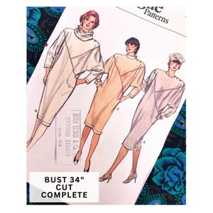 May include: A vintage dressmaking pattern with illustrations of three dresses. The pattern includes the text "BUST 86cm CUT COMPLETE" and the brand "JOHN LEWIS & Co. OXFORD STREET". The dresses are in white, peach, and light pink.