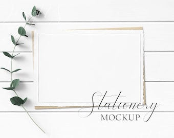 5x7 Stationery Mockup Styled with textured paper, craft envelope, and eucalyptus on a white wood background. Showcase your creations!