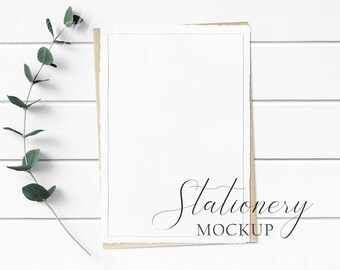 5x7 Stationery Mockup Styled with textured paper, craft envelope, and eucalyptus on a white wood background. Showcase your creations!