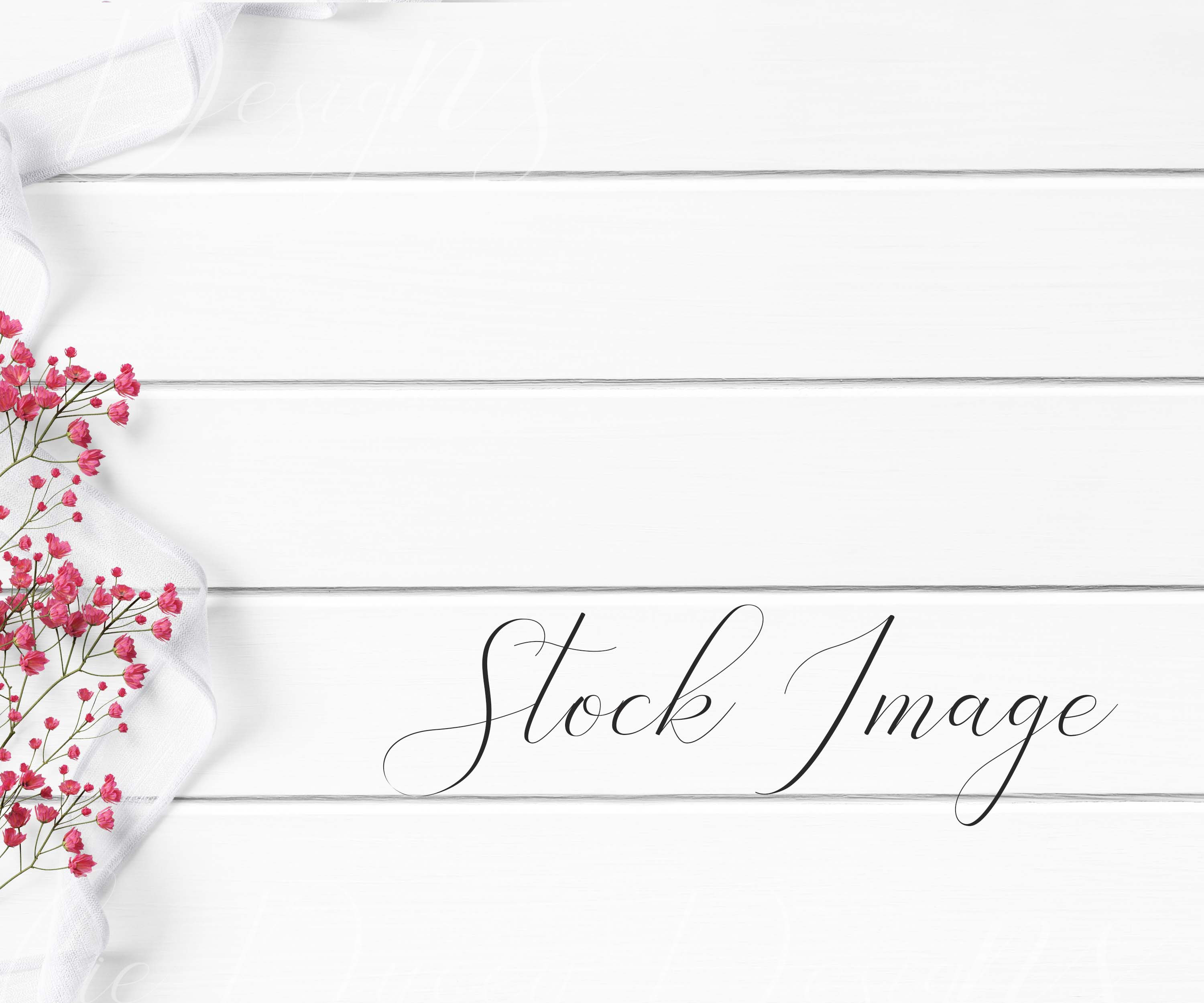 Styled Flat Lay with festive red flowers and white ribbon on a white wood background. Great for your blog, social media, and more!