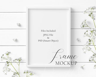 5x7 White Wood Frame Mockup Styled with beautiful flowers on a white wood background in both JPEG and PSD (Smart Object) formats.