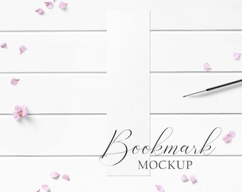 2x8 Bookmark Mockup Styled with textured paper and pink flowers on a white wood background. Great for your online store and social media!