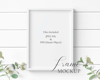 5x7 White Wood Frame Mockup with greenery on a white wood background in both JPEG & PSD (Smart Object) formats.