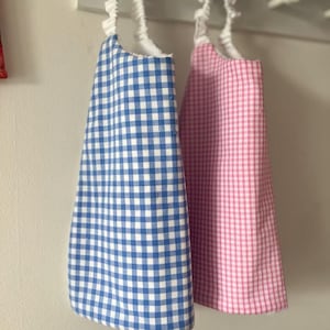customizable waterproof organic terry cloth elasticated canteen towel, nursery towel, large elastic bib