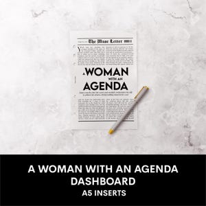 May include: A white sheet of paper with a black and white newspaper clipping on it. The clipping has the title "A Woman With An Agenda" and text about a woman who carefully orchestrates her life. A silver pen with a gold top is lying on the paper. The text "A Woman With An Agenda Dashboard A5 Inserts" is printed in black on a black background.