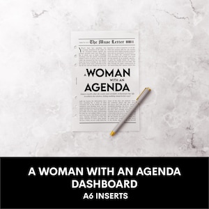 May include: A white A6 insert with the text "A WOMAN WITH AN AGENDA" and a pen. The insert has a newspaper-like design with the title "The Muse Letter". The pen is gray with a gold tip.