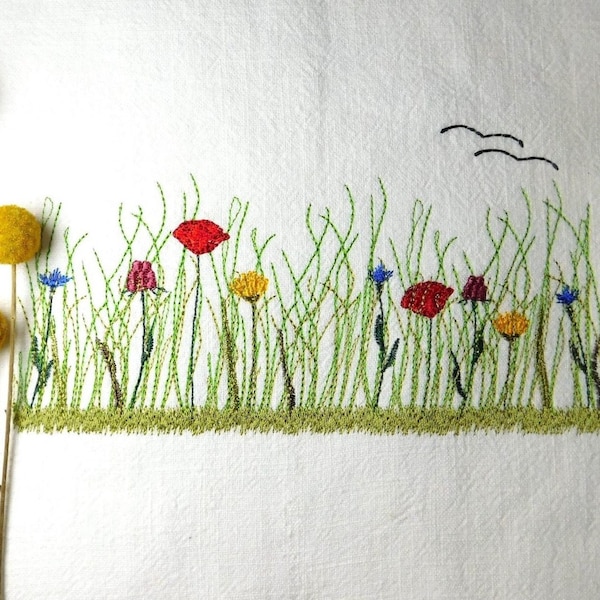 Embroidery file flower meadow with poppies in several sizes.