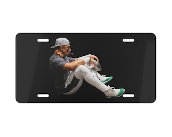 Philadelphia Eagles Super Bowl 59 LIX Champions Jalen Hurts with Cigar and Lombardi Trophy Vanity License Plate Black Background KC Chiefs