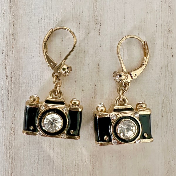 Vintage Betsy Johnson Retro Camera Dangle Earrings. Like New Condition. Black and Gold with Rhinestone Accents. Lever Back Closures.