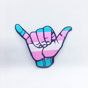 May include: A blue, pink, and white hand making the shaka sign. The hand is outlined in black.