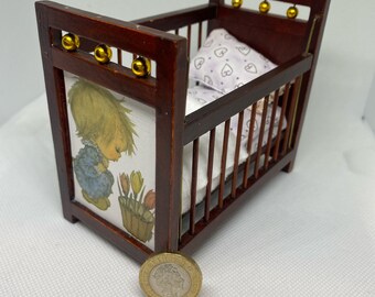 Dolls house miniature cot with bedding 12th scale