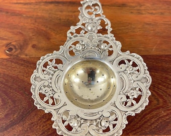 Silver tea strainer