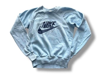 Blauw en marineblauw kindersweater jaren 70