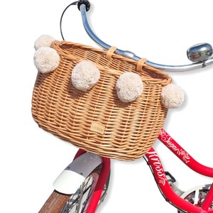 Wiklibox wicker bike basket DUMPY in NATURAL color mounted on belts with pompoms (many variants). Polish product