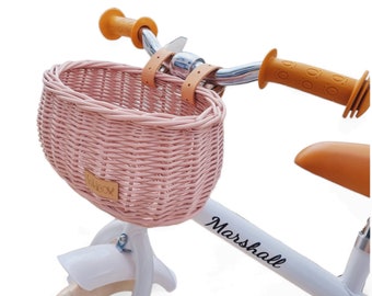 Wiklibox wicker bike basket for kids mini DUMPY in DUSTY PINK color mounted on belts. Balance bike basket. Scooter basket