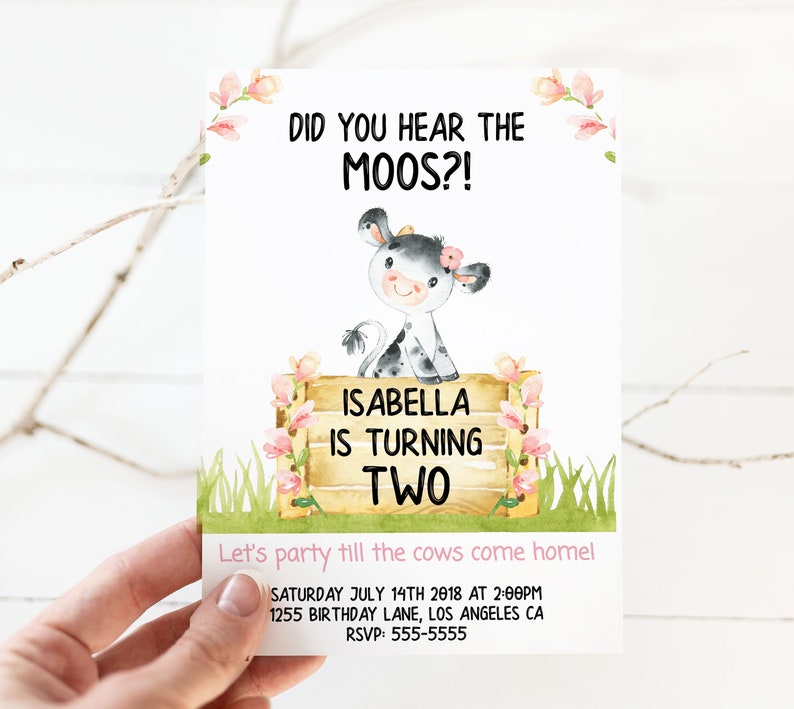 May include: A pink and white cow with a pink flower on her head is standing behind a wooden sign that says "Isabella is turning two". The sign is surrounded by pink flowers. The text "Did you hear the Moos?!" is at the top of the invitation. The invitation also includes the date, time, and location of the party.