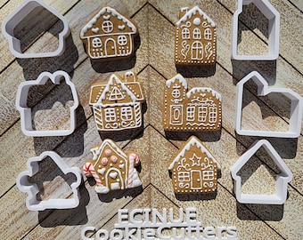 May include: An assortment of gingerbread house cookie cutters and decorated gingerbread cookies. The white plastic cutters are in various house shapes. The gingerbread cookies are decorated with white icing and candy canes. The text "ECINUE CookieCutters" is at the bottom.