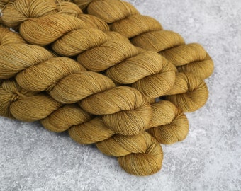 Hand Dyed Yak Yarn / Old gold / Merino yak nylon 70/20/10 / Semi solid tonal sock wool / golden yellow yarn