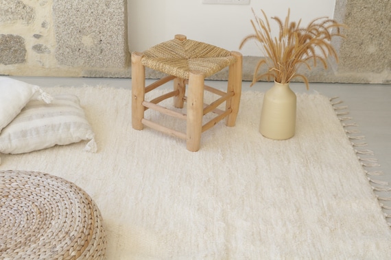 15 tapis beige, crème, blanc tendance pour un salon lumineux - NuageDeco