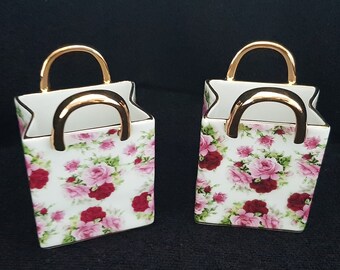 Pair of little ceramic shopping bag ornaments decorated with roses and gold handles