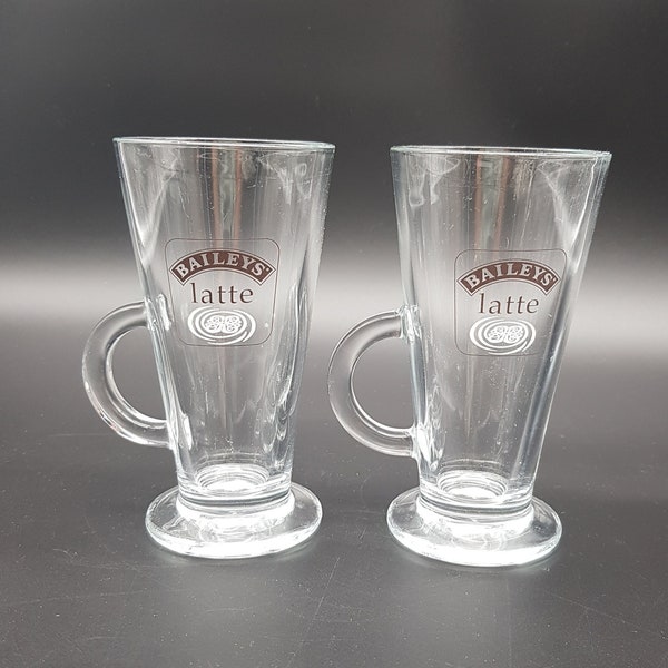 Pair of tall glass Baileys latte glasses