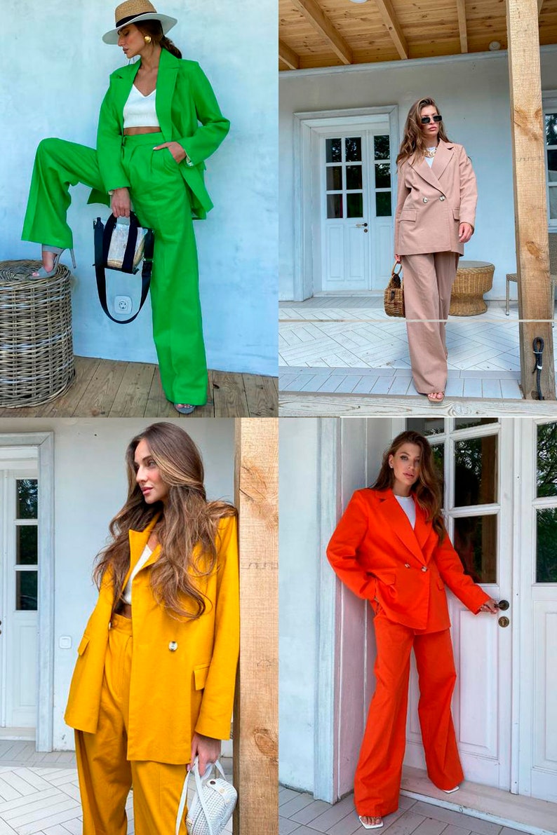 May include: Four women wearing matching pantsuits in different colors: green, beige, yellow, and orange. Each woman is standing in a different location, with a white background behind them.