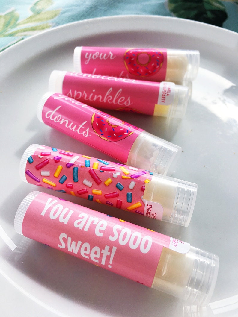 Handmade Lip Balm in a variety of DONUT designs for your next party. Customized chapstick in a variety of flavors, colors, and designs.