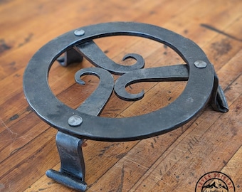 Salvamanteles decorativo forjado a mano