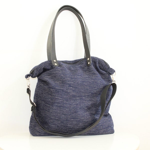 Bag in predominantly blue cotton fabric, blue fabric shoulder strap, versatile bag, minimal blue shoulder strap