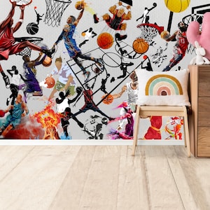 A gym interior with a wall mural featuring a basketball theme. The mural is a collage of basketball players in various poses, basketballs, and basketball hoops. The gym also has a weight bench, dumbbells, a kettlebell, and a blue exercise ball.