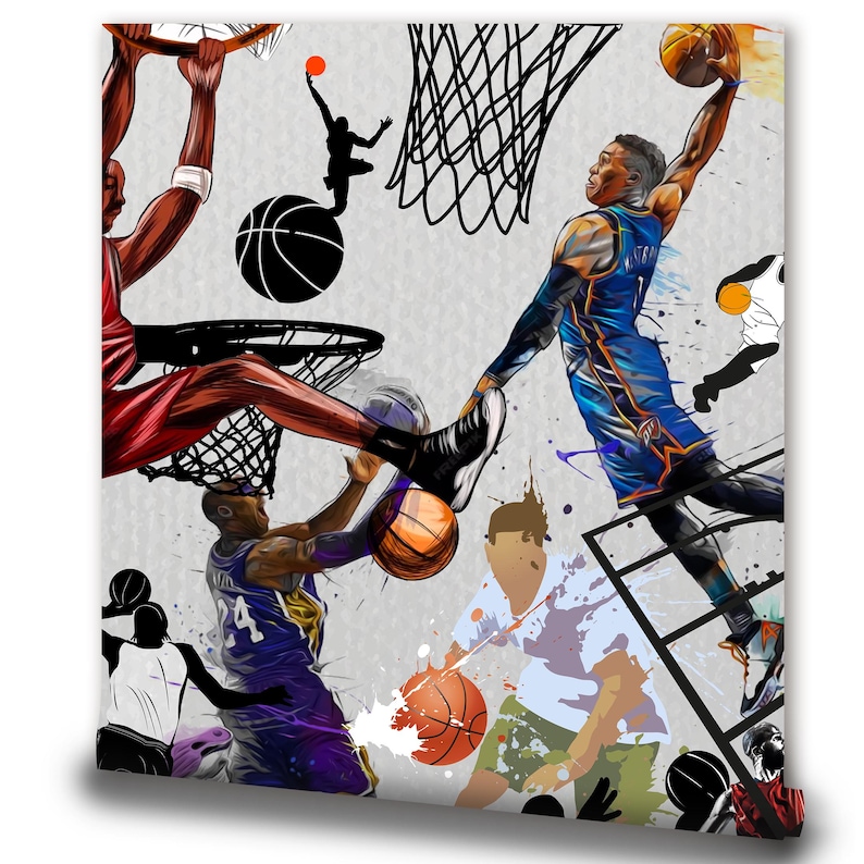 A gym interior with a wall mural featuring a basketball theme. The mural is a collage of basketball players in various poses, basketballs, and basketball hoops. The gym also has a weight bench, dumbbells, a kettlebell, and a blue exercise ball.