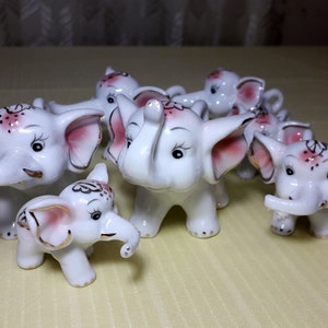 7 Adorable elephant figurines Vintage bisque animal statuette Retro hand painted collectible Porcelain miniature family Christmas gift