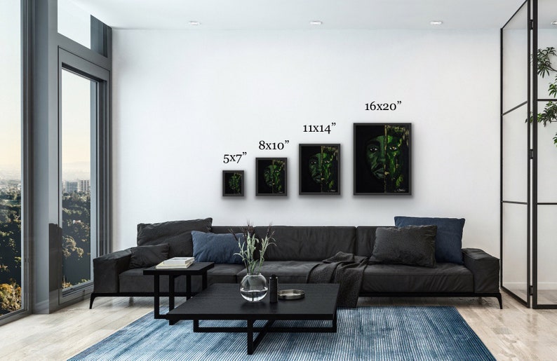 May include: A mockup of four framed art prints of a woman's face with green foliage, in various sizes: 5x7 inches, 8x10 inches, 11x14 inches, and 16x20 inches. The prints are displayed on a white wall in a living room setting.