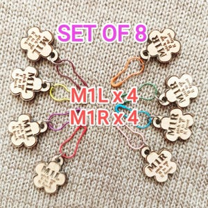 Op de afbeelding: Een set van acht houten stekenmarkeerders in bloemvorm, met kleurrijke metalen sluitingen. De markeringen zijn gemarkeerd met "M1L" en "M1R" met instructies. De tekst "SET OF 8" en "M1Lx4 M1Rx4" is ook zichtbaar.
